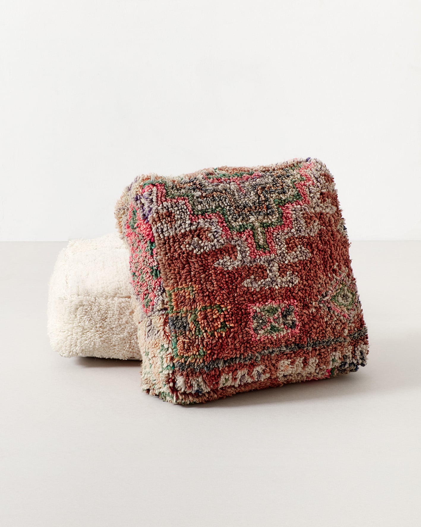 Richly decorated Moroccan pouf, upside down