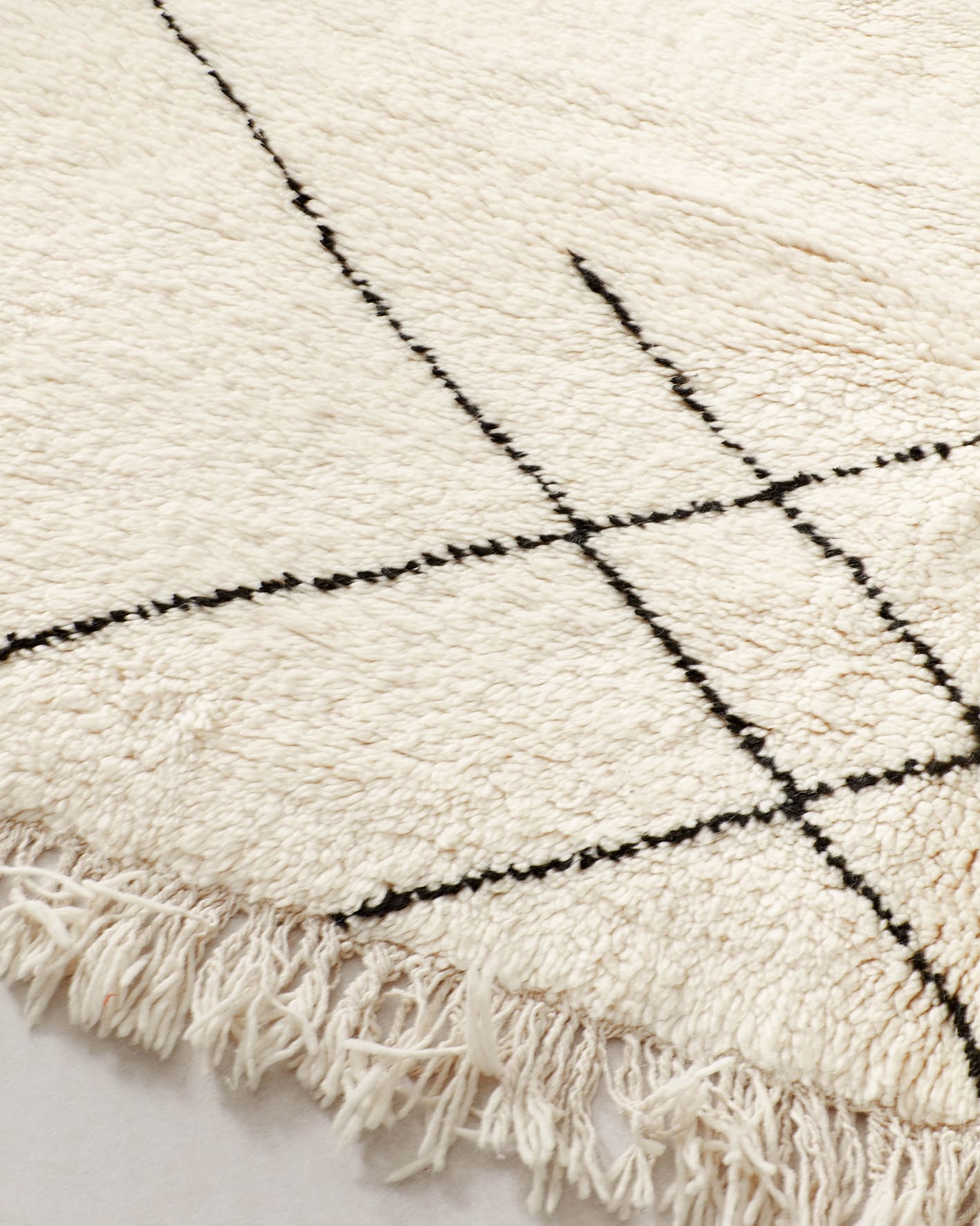 Asymmetrical Beni Ourain rug, fringe
