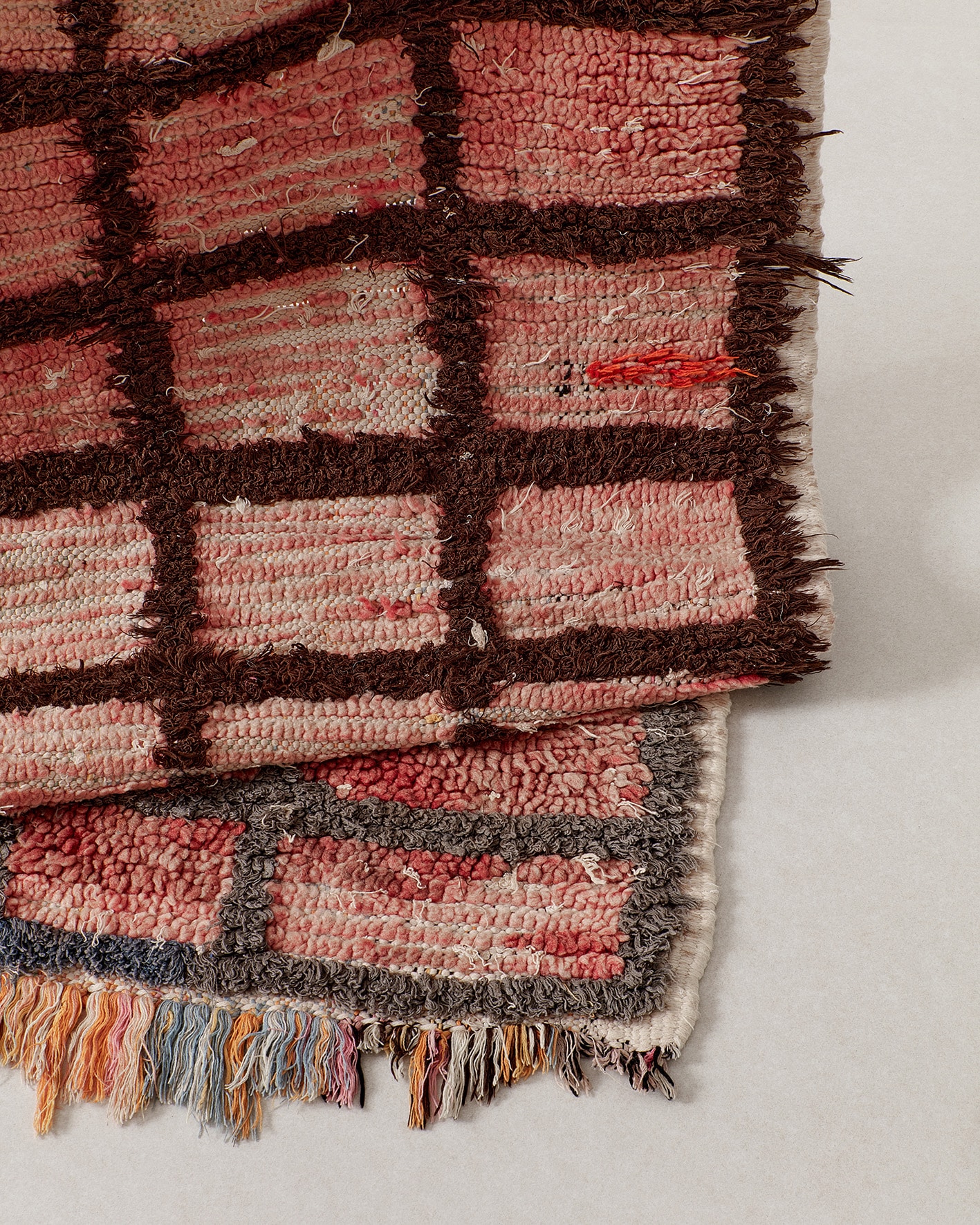 Pink vintage rug with brown, texture
