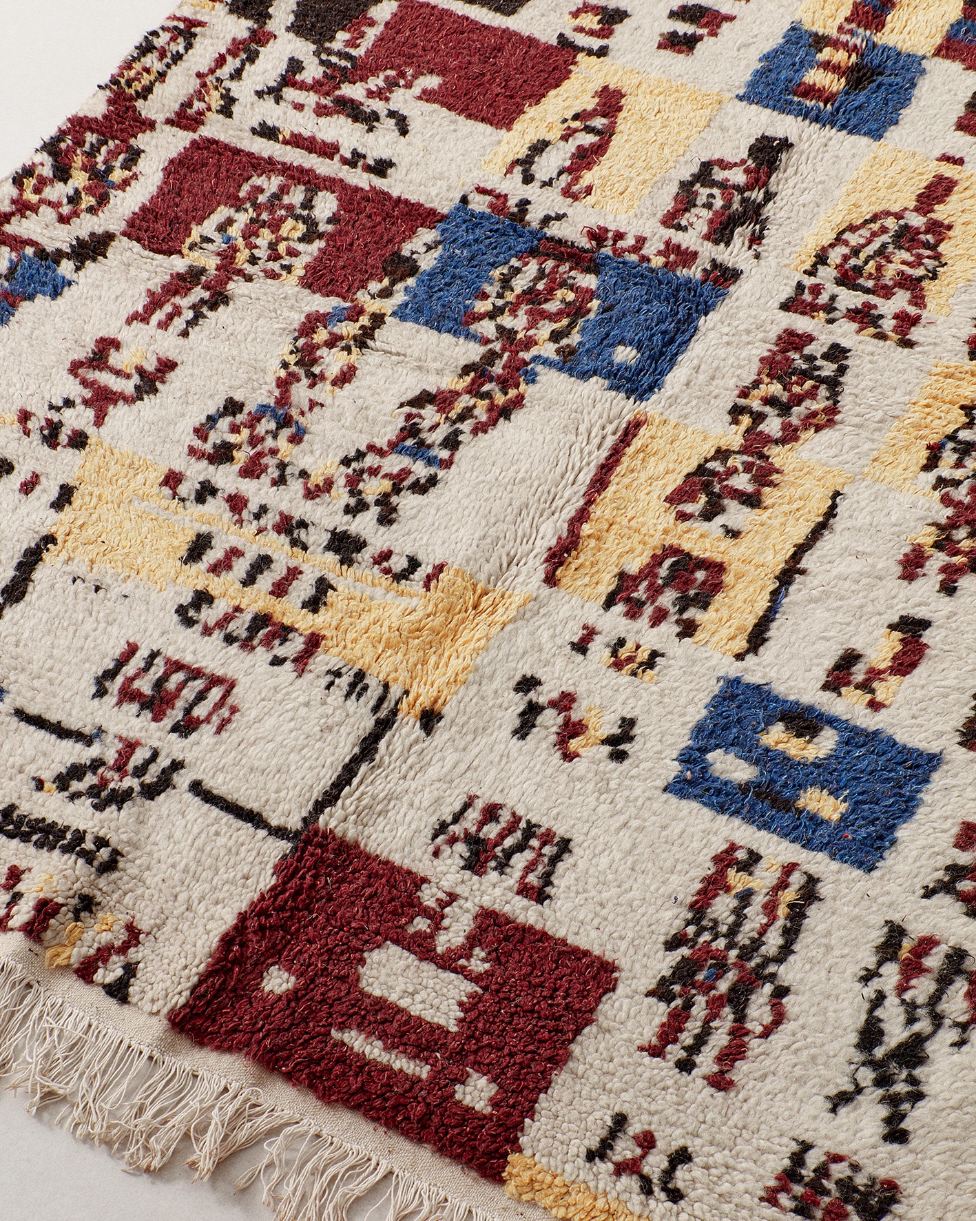 Vintage Berber rug with a tribal design, texture