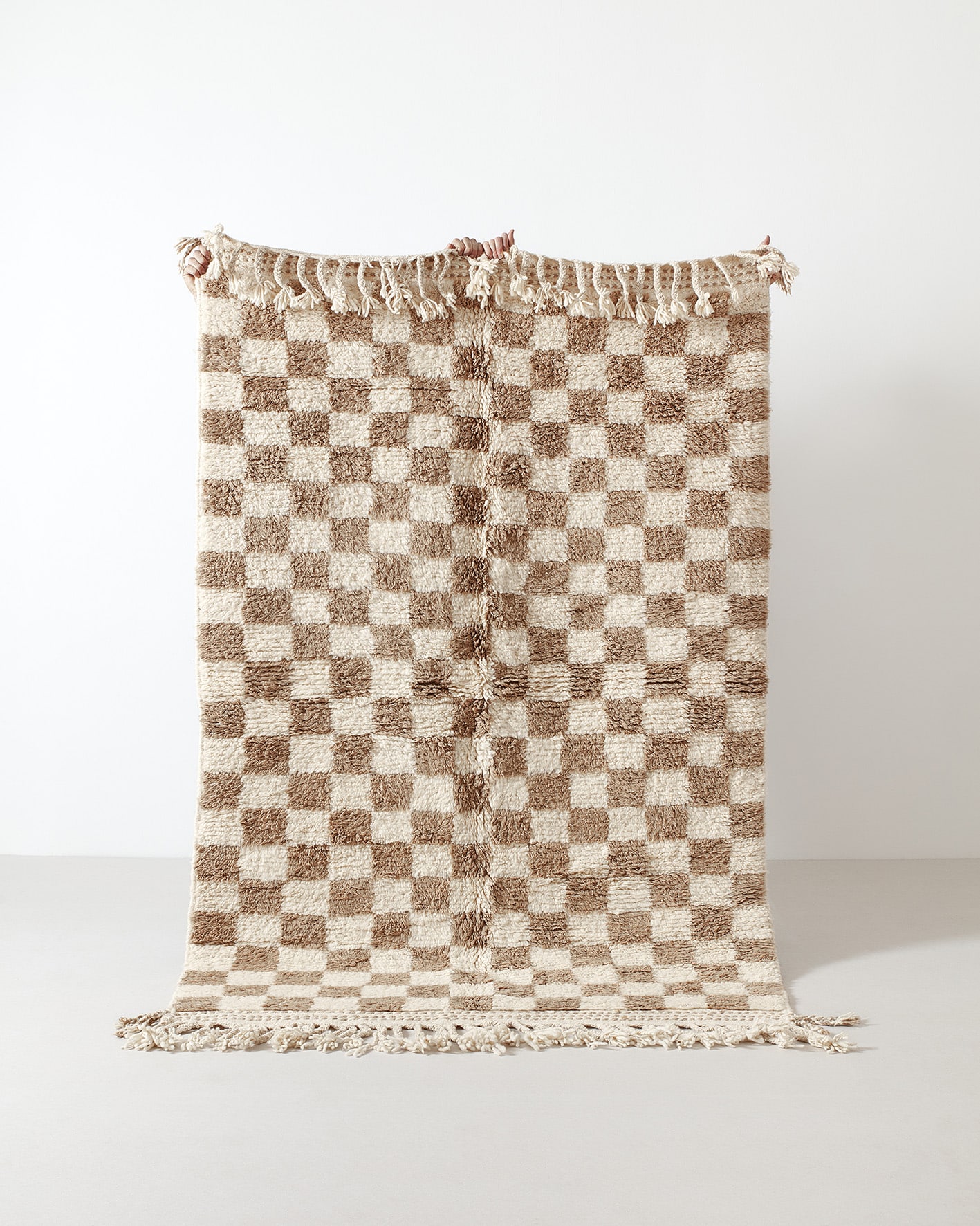 Light brown checkered rug
