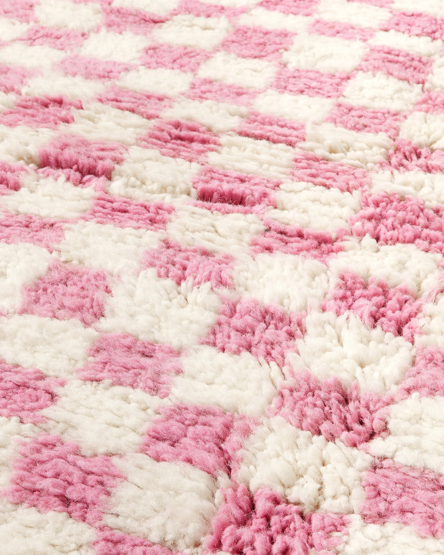 Pink checkered rug, close