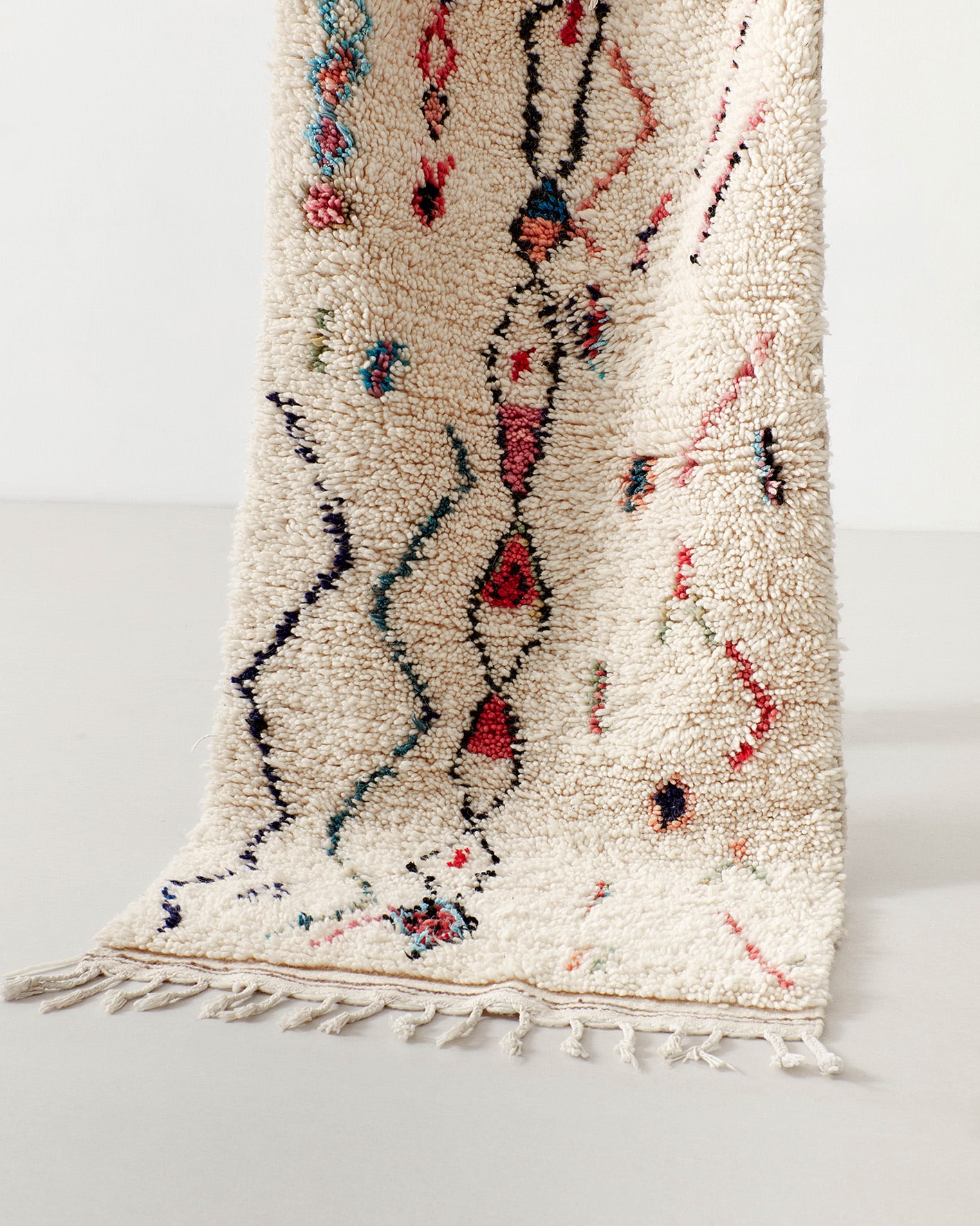Tiny rug with abstract line drawings, texture