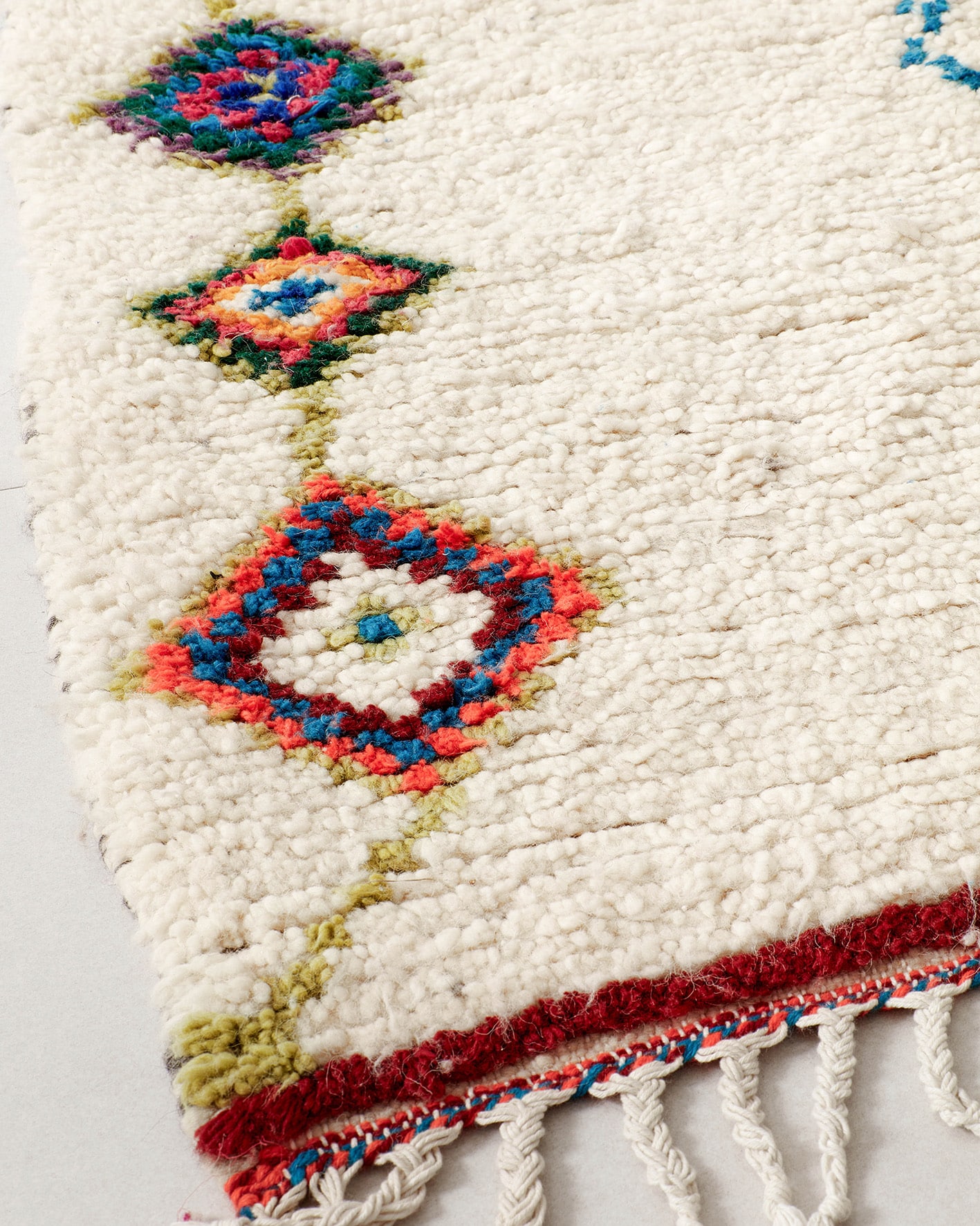 Small rug with colourful line drawings, texture