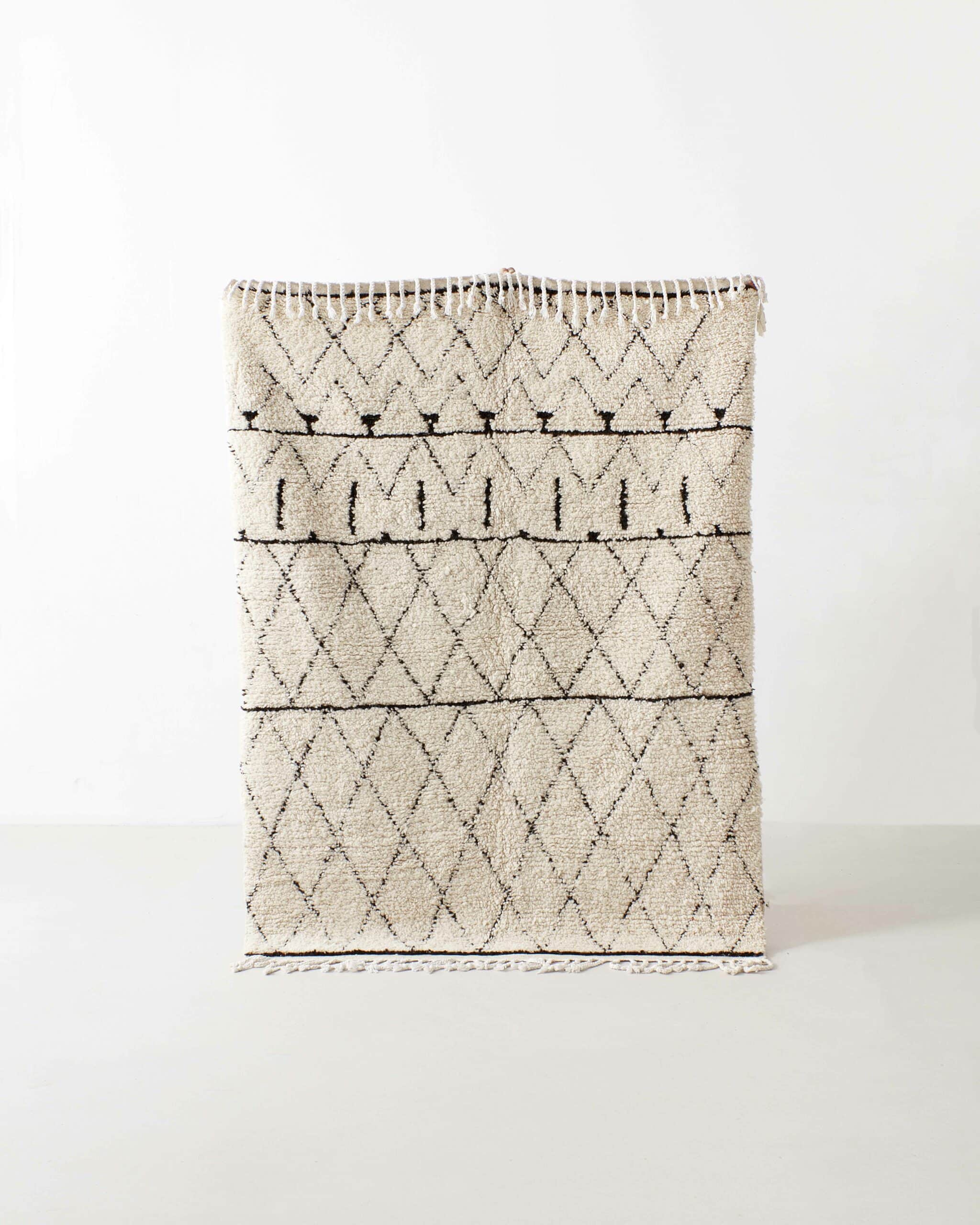 Berber rug w a repeating pattern