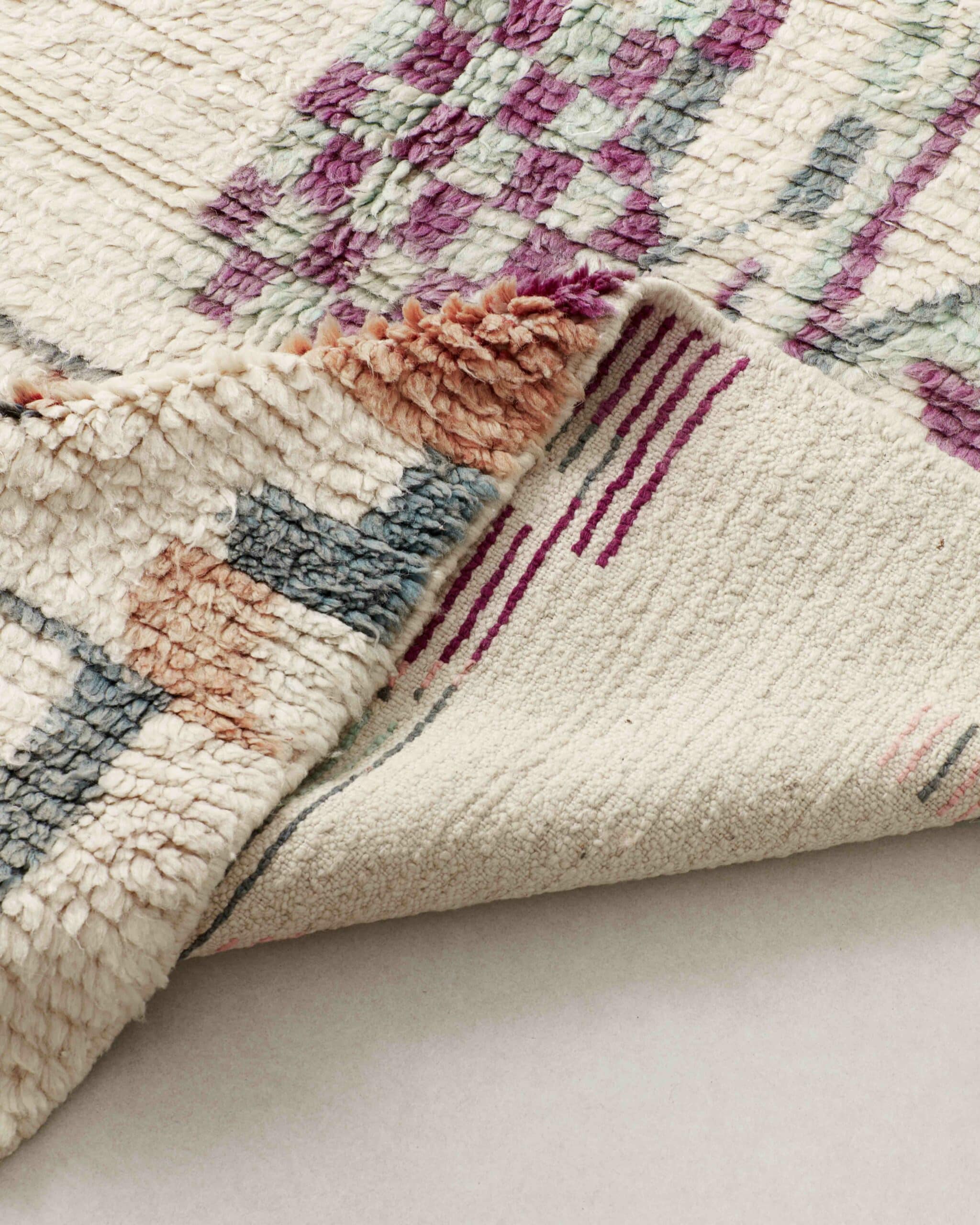 Off-white Boujaad rug with muted details, close up