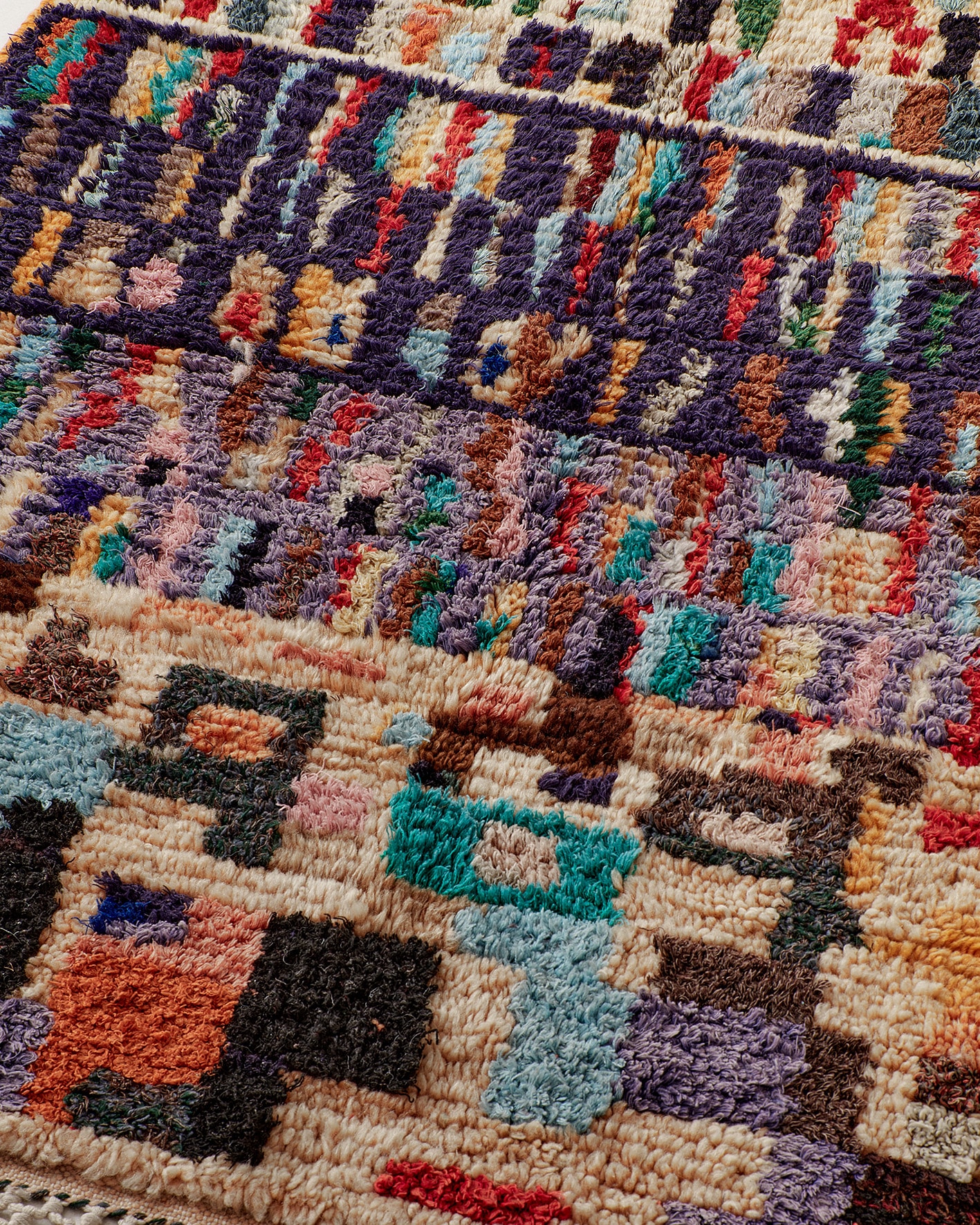 Vintage rug with multicolour lines and squares, detail