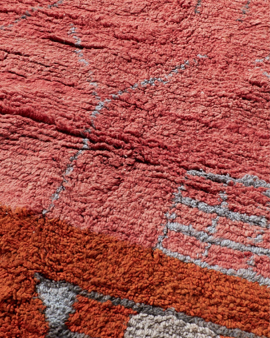 Mauve-burnt orange rug, detail