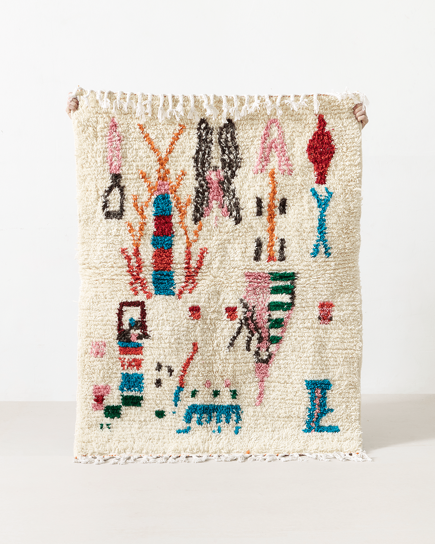 Azilal rug with colorful pictograms