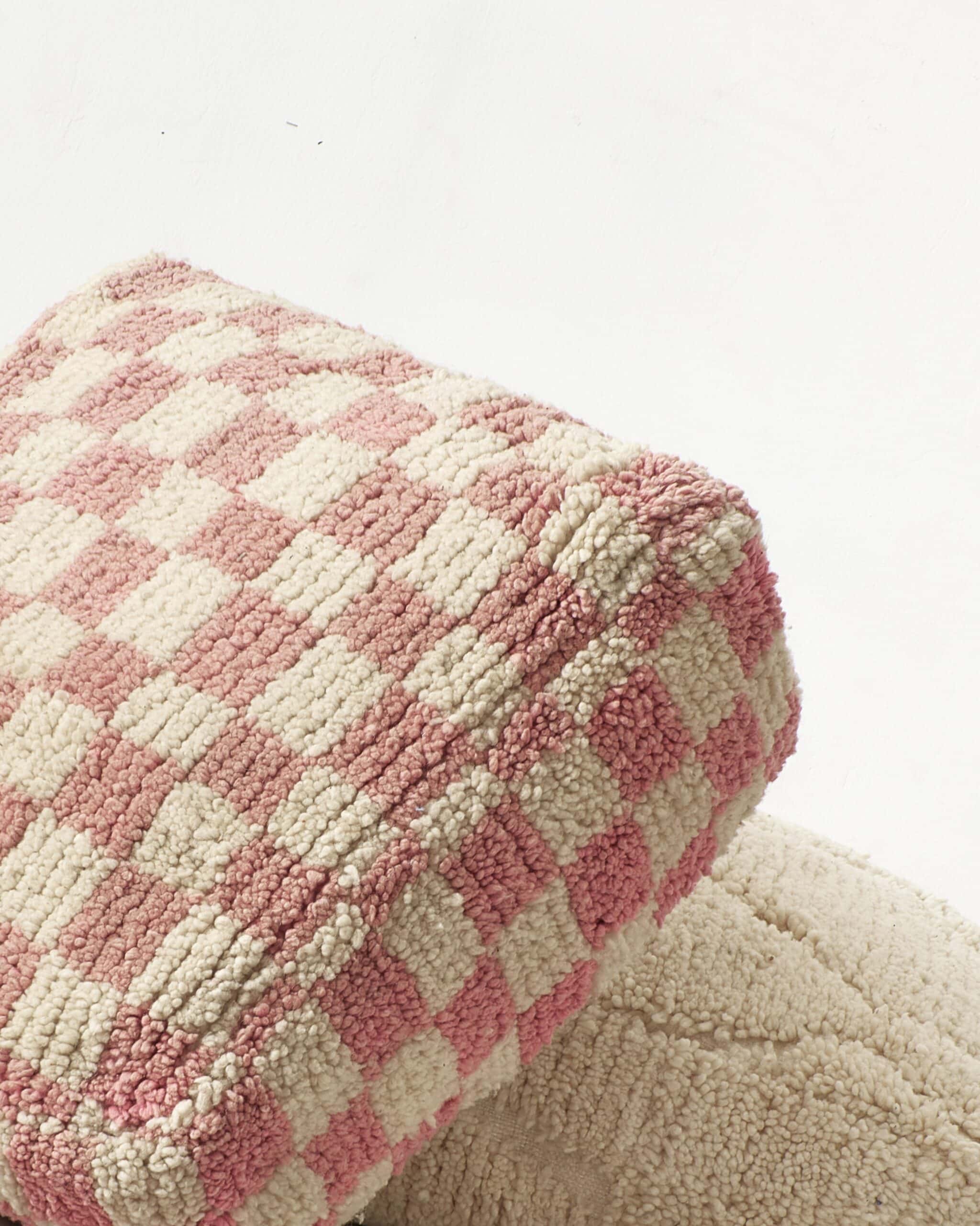Faded pink checkered rug