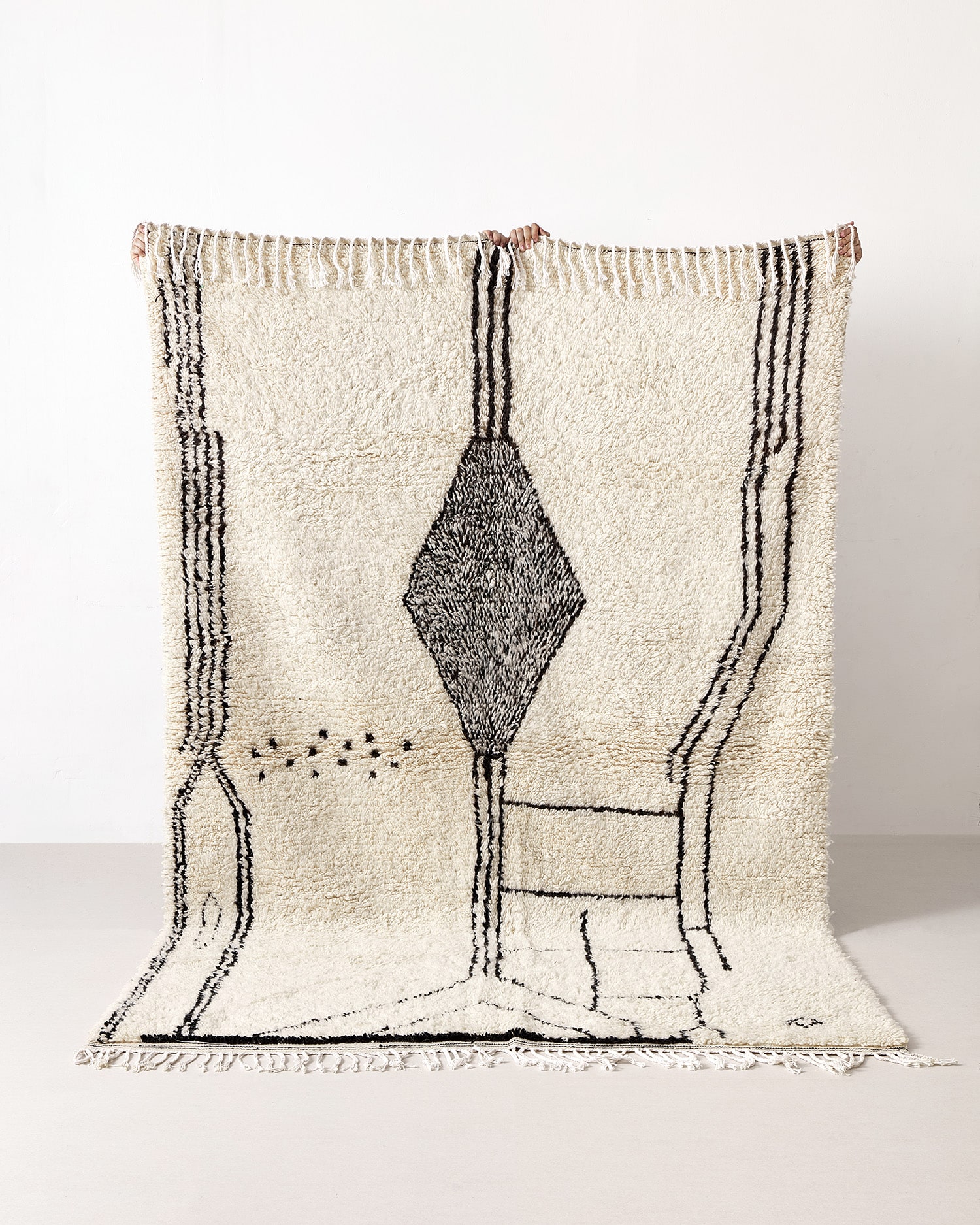 Berber rug with tribal motifs